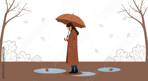 Melancholic autumn: a woman under an umbrella in the rain capturing solitude and season