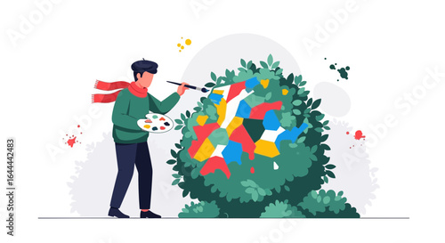 The artist paints a colorful geometric pattern on a bush with a brush on canvas outdoor creative expression  imagination