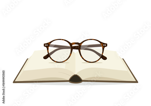 Round tortoiseshell glasses resting on an open book.
