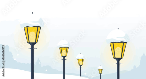 Winter scene with lampposts covered in snow providing a warm inviting light