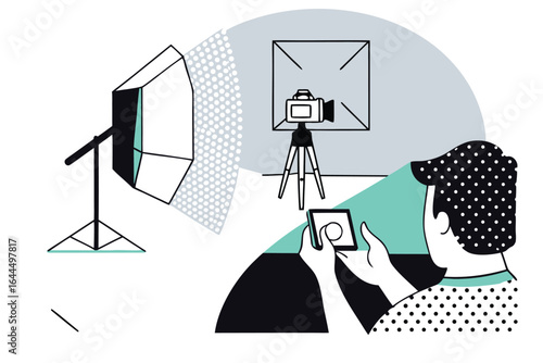 Artist using smartphone to photograph artwork in a studio with professional lighting