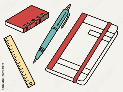 School and office supplies laid out flat including a notebook pen and ruler