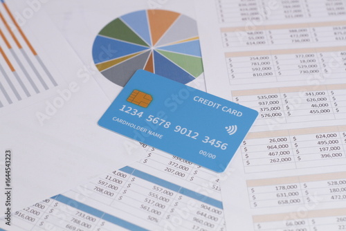 Businessman analyzing data charts and reports for marketing strategy, financial planning, accounting, and business development in modern office