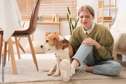 Young woman with dog trauma...