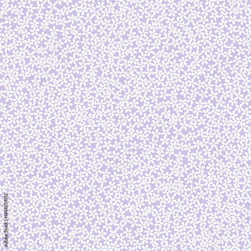 Seamless pattern of white daisies on pastel purple background