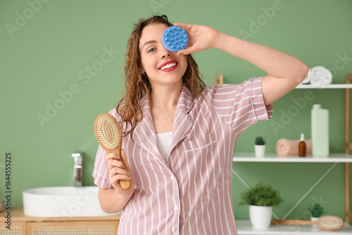Young woman with hair scalp...