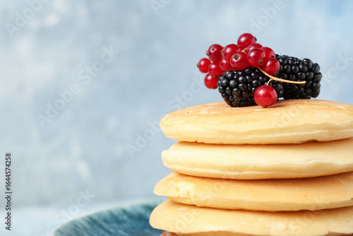 Plate of sweet pancakes wit...