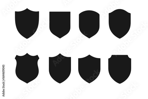 Black shields vector set. Security badge shape collection. Blank emblem silhouette for logo design. Protection, safety, guard icon. Medieval knight heraldry crest template.
