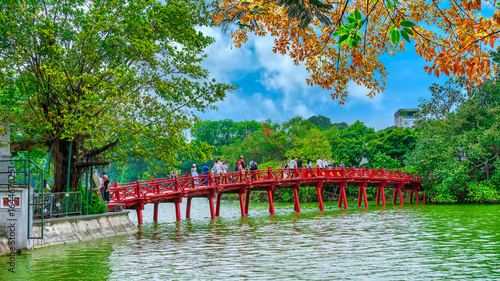 Red Bridge- The Huc Bridge in Hoan Kiem Lake, a lake in the historical center of Hanoi, the capital city of Vietnam