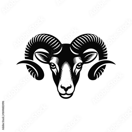 Black silhouette of a ram's head with large curved horns on white background Vector illustration of