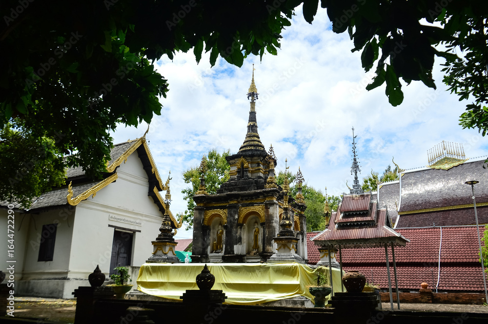 Fototapeta premium Pagoda and Church, Lanna Architecture, Symbols of Buddhism, South East Asia at Wat Phra That (Doi Noi), Chulakiri, Chiang Mai, Northern Thailand