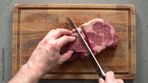 cutting meat with knife
