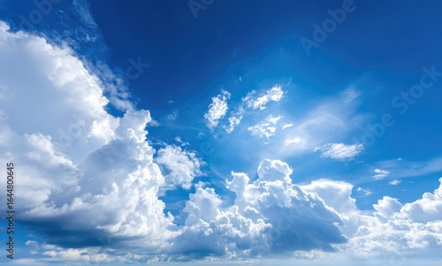 Vast blue sky filled with fluffy clouds