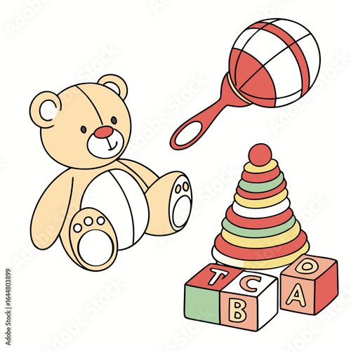 A collection of classic baby toys including a teddy bear a rattle stacking rings and alphabet blocks arranged on a white background