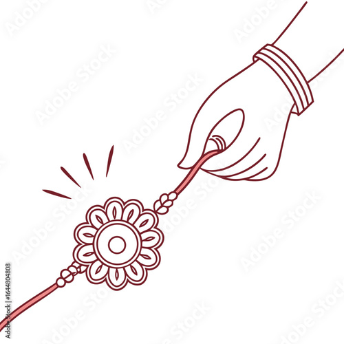 A delicate hand adorned with bangles holds a rakhi bracelet with a floral design celebrating the bond of raksha bandhan