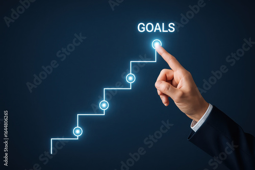 Business success and career progress depend on clear growth strategy and goal achievement shown by hand pointing at illuminated steps leading to goals in dark background