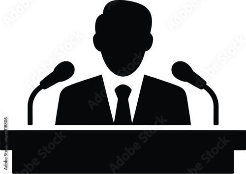 Silhouette of a businessman speaking at a podium with microphones