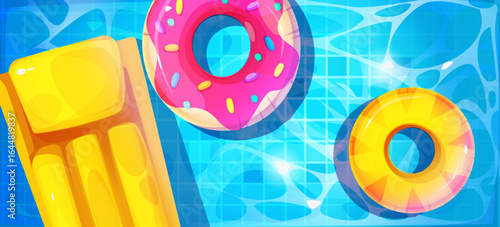 Pool party scene from top view - bright blue water with floating donut rings and yellow air mattress. Sparkling surface reflection for summer vacation design with inflatable toy for beach game