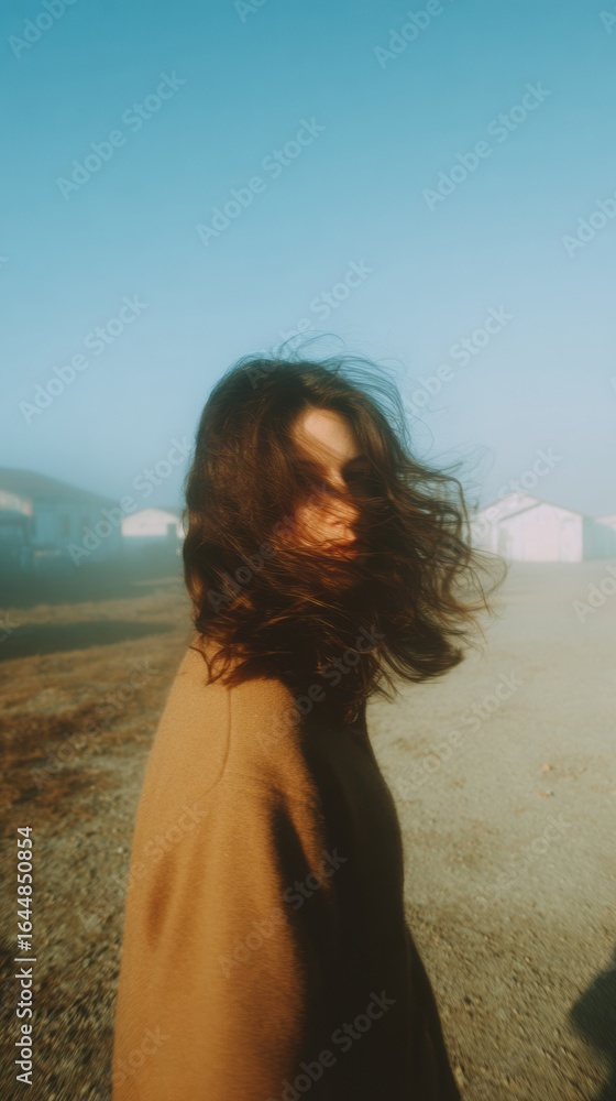Fototapeta premium Modern Millennial Woman in Foggy Industrial Setting High-Quality Atmospheric Portrait for Lifestyle Marketing and Social Media Campaigns