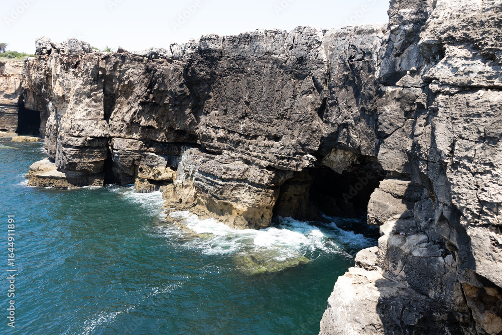 Obraz premium rugged cliffs and sea cave at Boca do Inferno in Cascais, Portugal
