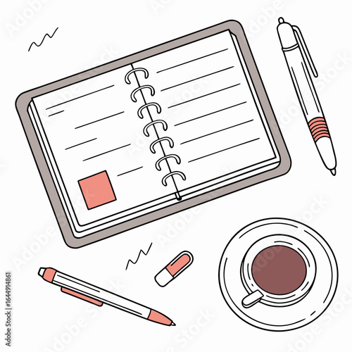 Desk essential with notebook, pen, coffee and pills