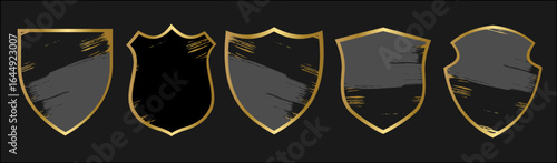 Collection of shields with colorful abstract shapes