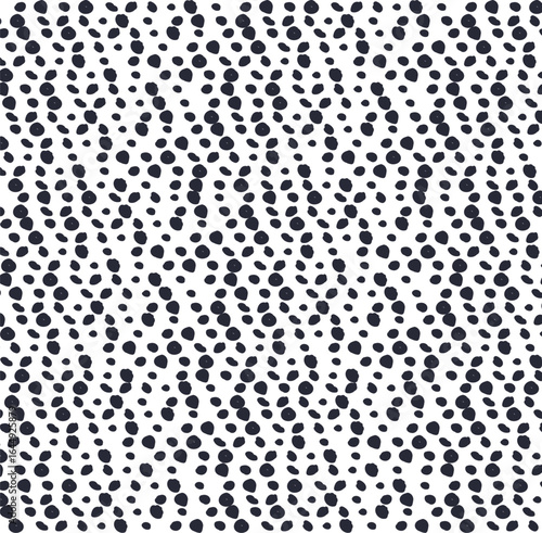 A mottled texture or screentone of closely spaced dots.