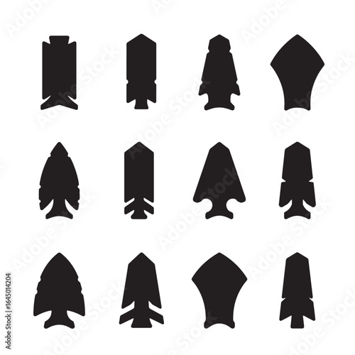 Collection of diverse black arrowhead silhouettes depicting ancient tools and designs