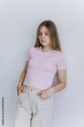 Pretty young blondie tender teenage caucasian girl. Close up portrait of a young woman