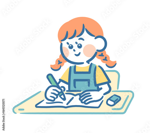 Girl writing in a notebook at a desk