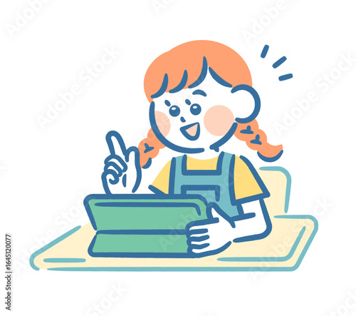 A girl studying on a tablet at school
