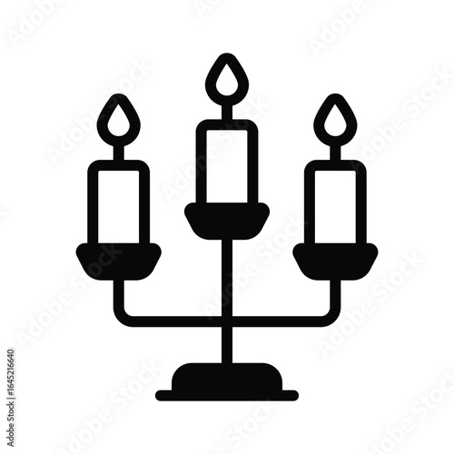 A solid icon showing elegant candle stand decor