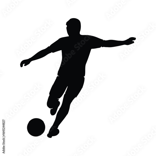 Soccer Player Silhouette Kicking Ball


