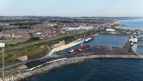 Aerial birds eye view drone shot Seaham County Durham north England UK seaside town coast sunny summers day SR7