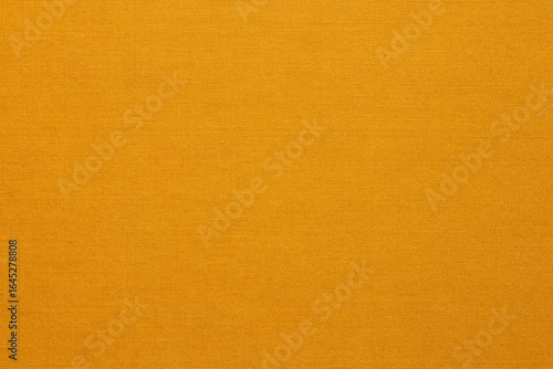 Orange fine weave fabric close-up for background for textures or wallpapers, book cover