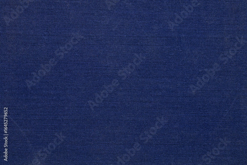 Dark blue fabric book as background and texture for design