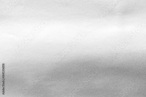Silver background foil leaf metallic texture wrapping paper shiny glowing white grey solid reflective gradient color metal pattern backdrop for wallpaper decoration element backdrop
