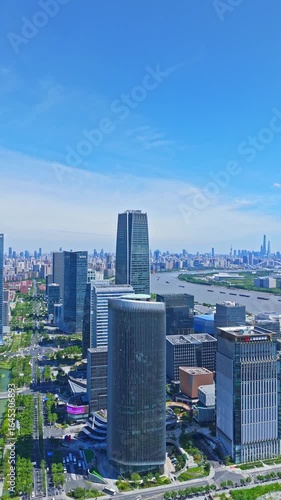4K real time Aerial view of The West Bund in Xuhui district, Shanghai, sunny day.