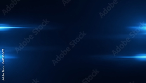 Abstract blue light streaks on dark background