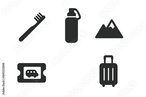 Essential travel items for a mountain adventure during summer vacation