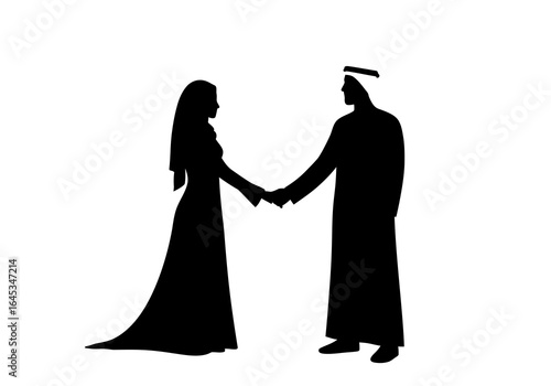 Silhouette of a Middle Eastern Couple Holding Hands in Traditional Dress