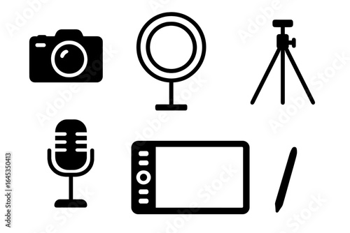Showcasing photography and content tools: camera, microphone, ring light, tripod, tablet, and stylus on a clean backdrop