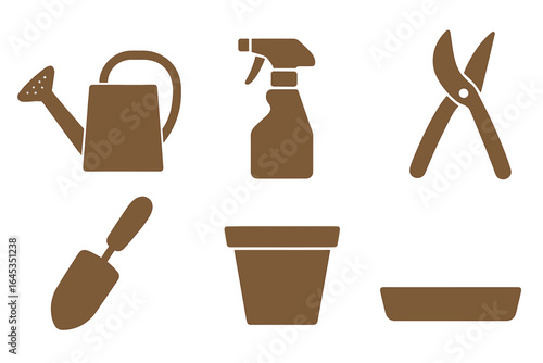 Gardening tools and supplies arranged for planting and nurturing plants indoors or outdoors
