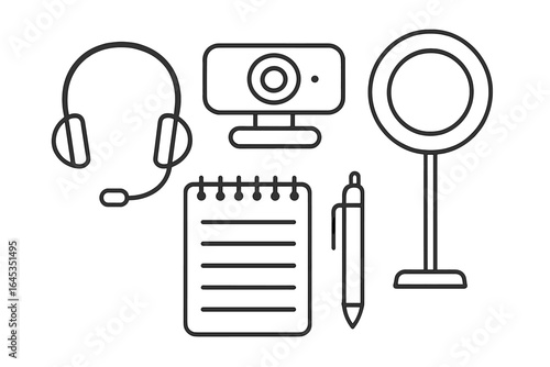 Workspace setup for online meetings includes a headset, webcam, notepad, pen, and light source during daylight hours