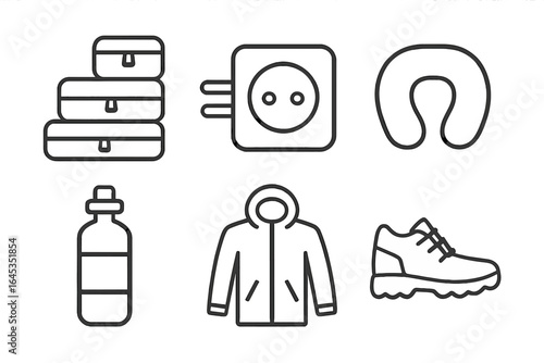 Travel essentials for a long journey, including clothing, snacks, and comfort items for an enjoyable experience