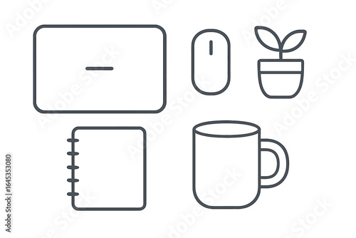Desk setup with plant, notebook, mug, and computer mouse for a minimalist workspace