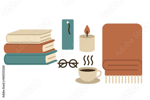 Cozy reading setup with books, coffee, and blanket on a relaxing afternoon