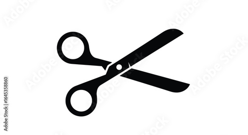 Black scissors with open blades isolated on white background
