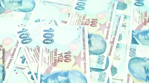 Turkish money slowly falls on top of each other