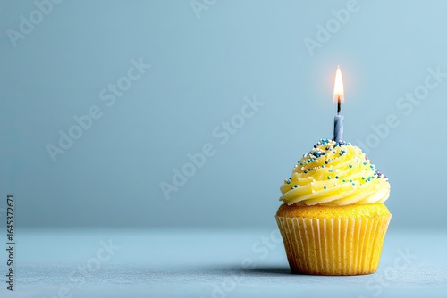 Wallpaper Mural Single birthday cupcake with lit candle Torontodigital.ca